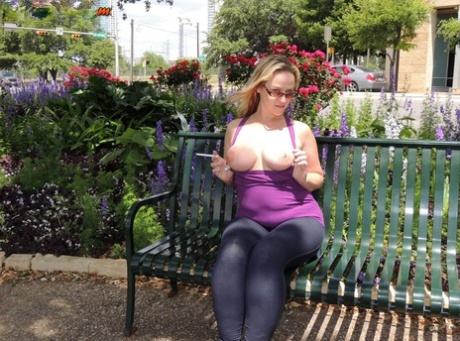 Big assed blonde Dee Siren fists her snatch in a car after public flashing