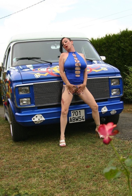 Mature amateur Mary Bitch gets naked inside a B-class van during solo action