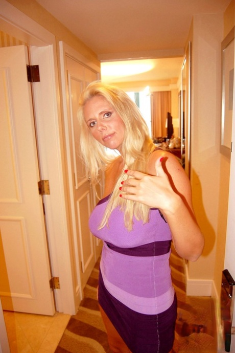 Busty blonde MILF Karen Fisher takes part in a POV fuck