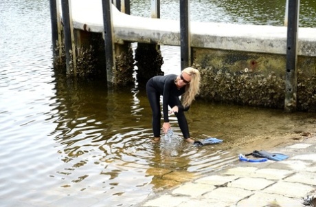 Blonde chick in wetsuit gets picked up at the lake for a quickie