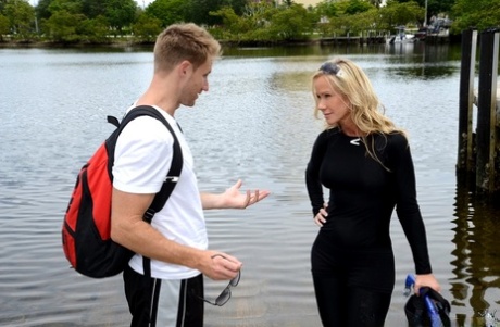 Blonde chick in wetsuit gets picked up at the lake for a quickie