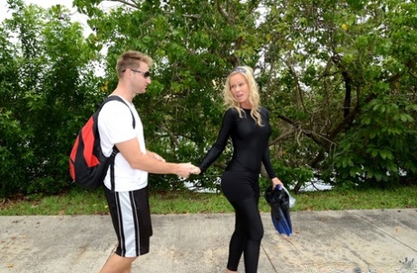 Blonde chick in wetsuit gets picked up at the lake for a quickie