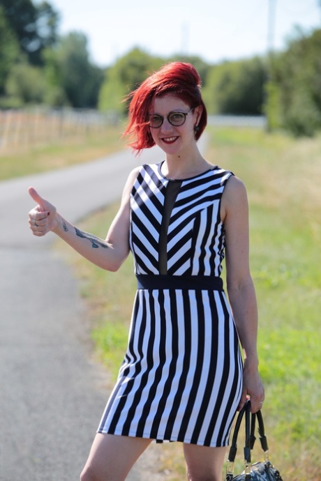 Redhead amateur has sex with two boys after exposing herself while hitchhiking