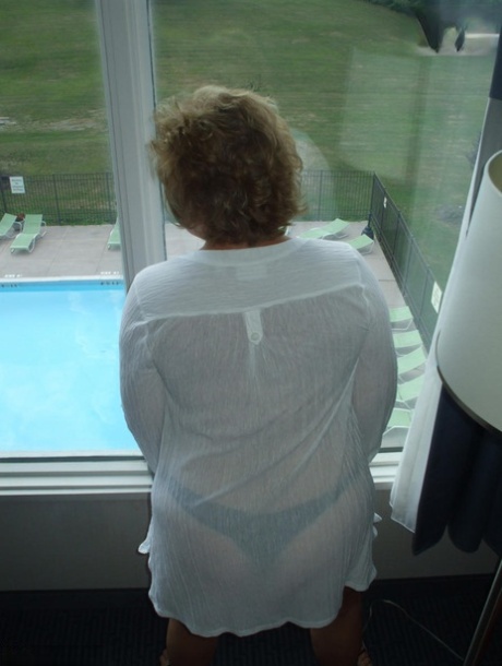 Older amateur Busty Bliss uncovers her natural tits during a POV scene