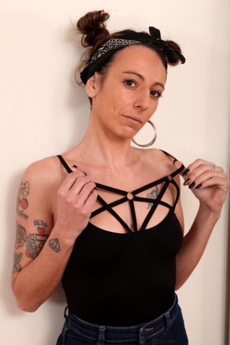 Older first timer lets her hair down before getting completely naked