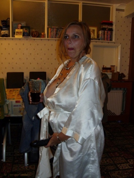 Fat old women use a strapon cock during the course of a threesome
