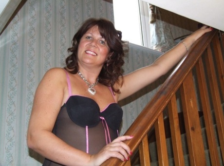Thick older lady Cassandra Uk looses her tits and pussy from sensual lingerie