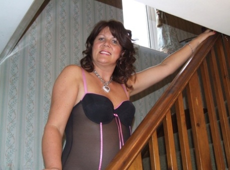 Thick older lady Cassandra Uk looses her tits and pussy from sensual lingerie