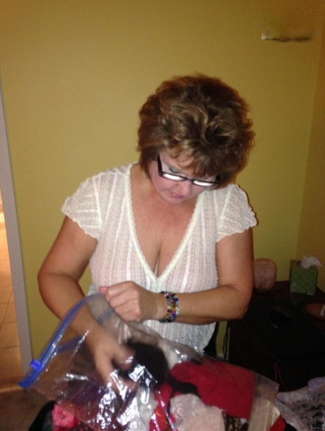 Older lady Busty Bliss uncovers her boobs while giving a POV blowjob
