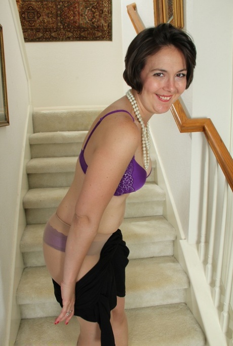 Beautiful mature woman Carlita Johnson removes satin underwear to spread ass
