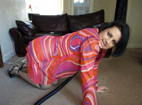 Fat mature wife gets turned on and plays with the vacuum cleaner