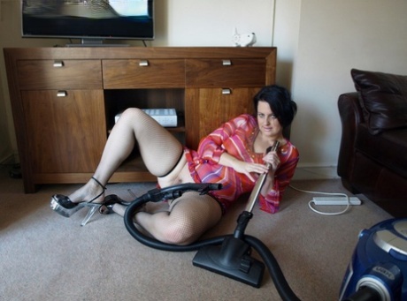 Fat mature wife gets turned on and plays with the vacuum cleaner