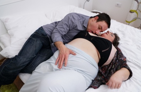 Obese older woman tongue kisses her toy boy before doggy style banging