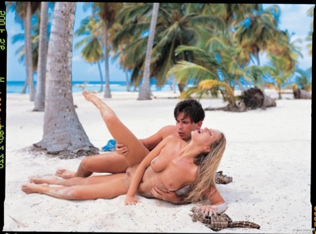 Hot blond chicks gets banged hard on the white sand of a tropical island beach