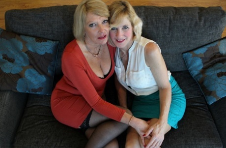 British housewives kiss on their way to first lesbian sex experience