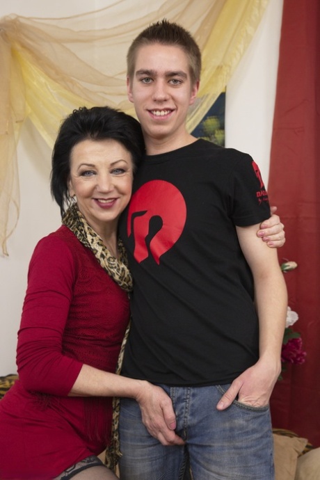 Short haired cougar gives young boy his first sex lessons