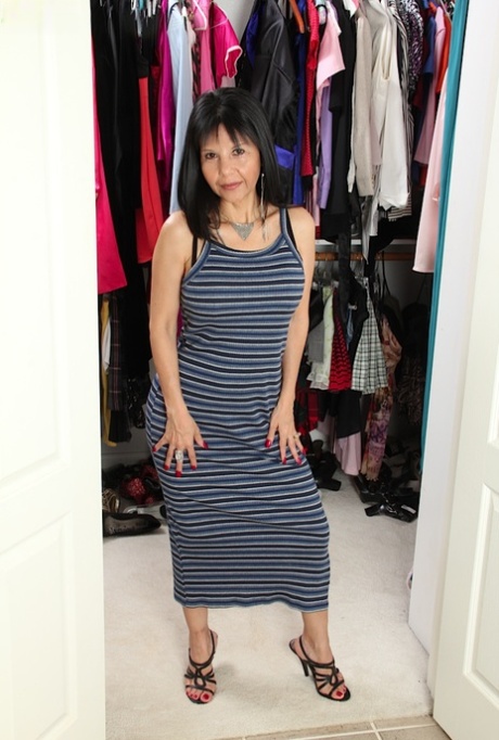 Mature mom Marcy Darling spreads her housewife twat while dressing for dinner