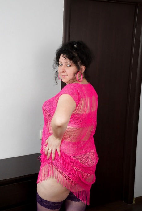 Shaved pussy of a mature fatty Gulya shown in pink lingerie