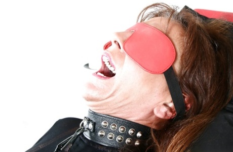 Mature European sex slave is bound and blindfolded by Lady Srarah