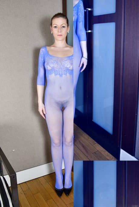 Older solo model Mischelle displaying hairy pussy in mesh bodystocking