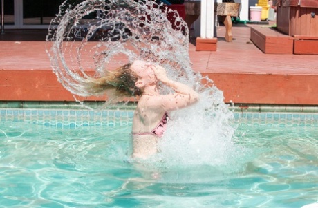 Mature woman Cody Hunter shows off her bald pussy after having a swim