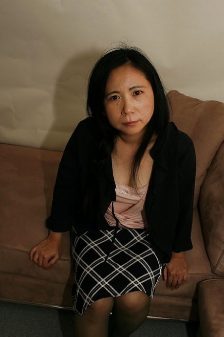 Naughty asian lady in pantyhose Yasuko Watanabe uncovering her chubby curves
