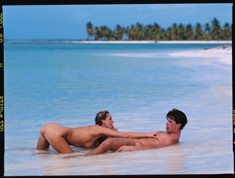 Mature Hungarian slut Mandy Bright fucks passionately on the sandy beach