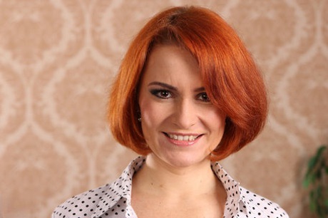 Redhead mom Sylvana C reveals her magnificent body and fingers herself