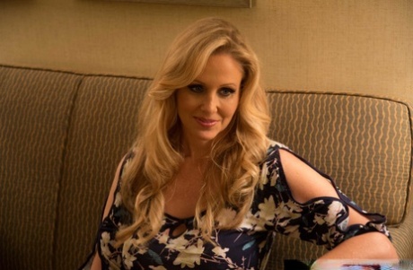 Fantastic looking MILF with big tits Julia Ann rides a hot dick in lingerie