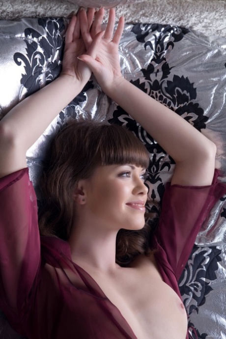 Glamorous Russian teen Candy Rose posing in her sexy red nightgown