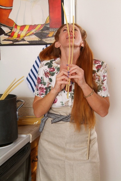 Mature MILF Wendy exposing her big booty & her shaved pussy in the kitchen