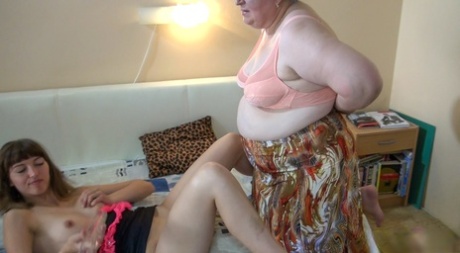 Old & young lesbians toying each other's horny pussy with a dildo