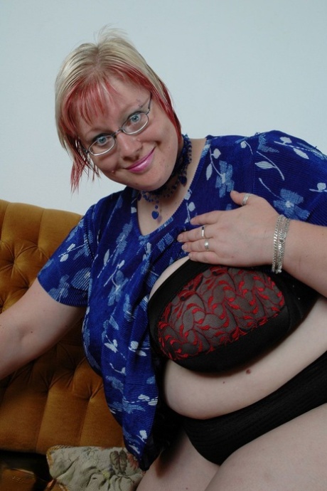 Short haired woman Diana unleashing her giant tits and exposing her fat body