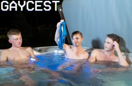 Two hunky young twinks and two horny DILFs enjoy a foursome in a jacuzzi